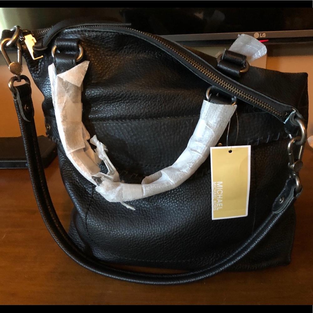 Michael Kors black leather purse. New with tags